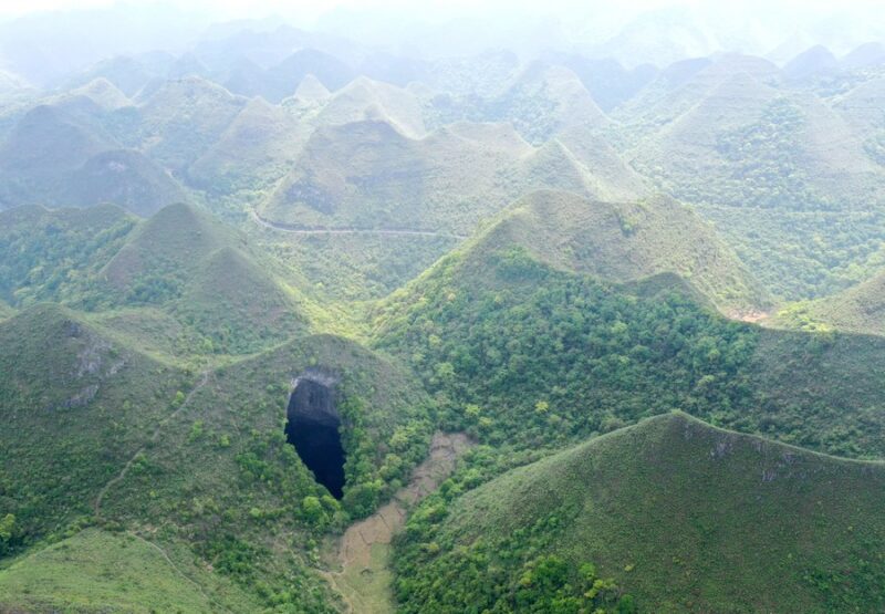 Aerial Photo taken on April 19, 2020 shows a Tiankeng, or giant karst sinkhole