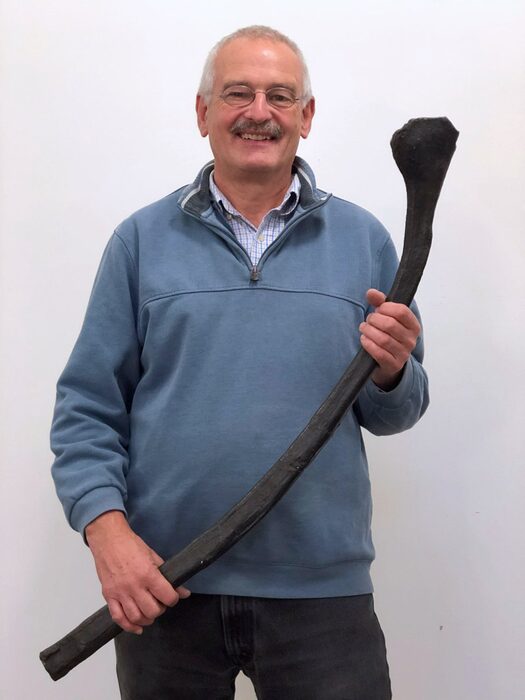 Dr Martin Sander with a rib of the larger ichthyosaur skeleton